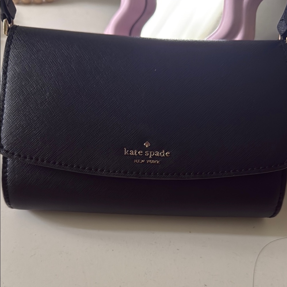 Kate Spade Black Leather Crossbody Bag with Flap Closure